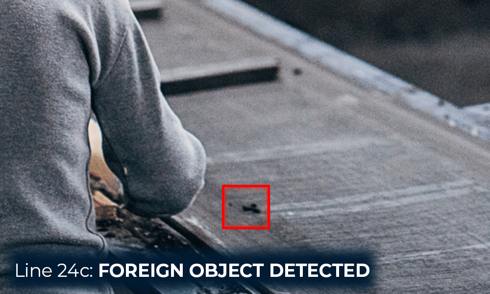 image Computer vision analysis of a conveyor belt showing a foreign object detected